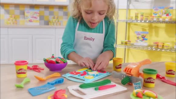 Girl playing with Play-Doh