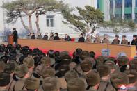 KCNA picture of North Korean leader Kim Jong Un visiting a vegetable greenhouse farm and tree nursery in Jungphyong, North Korea