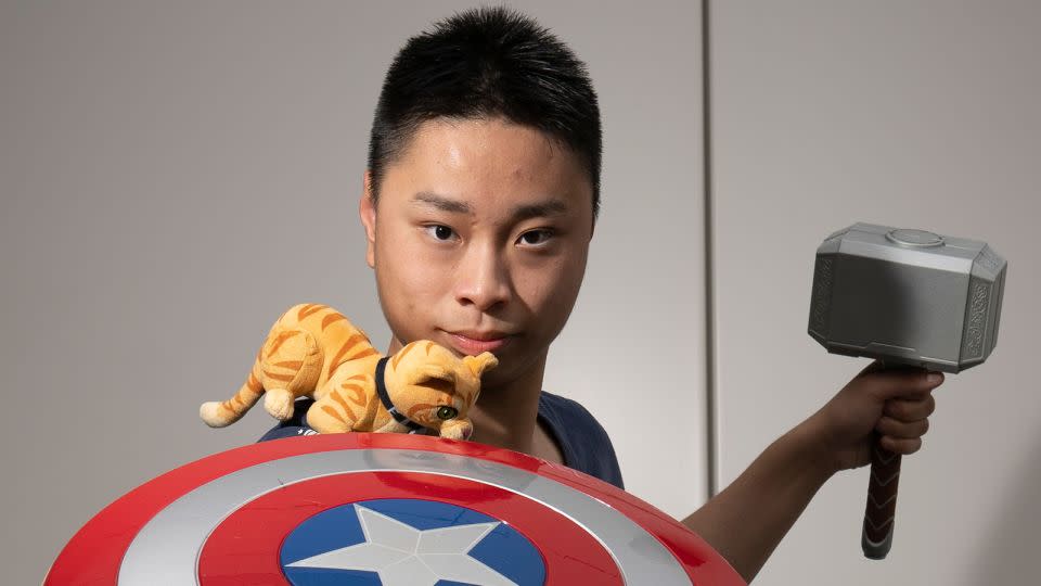 Oscar Yim, 21, visits the park two days a week. The cast members, he said, are his friends. “I wanted to see Captain America (today), he’s my favorite, but I met Captain Marvel instead.” - Noemi Cassanelli/CNN