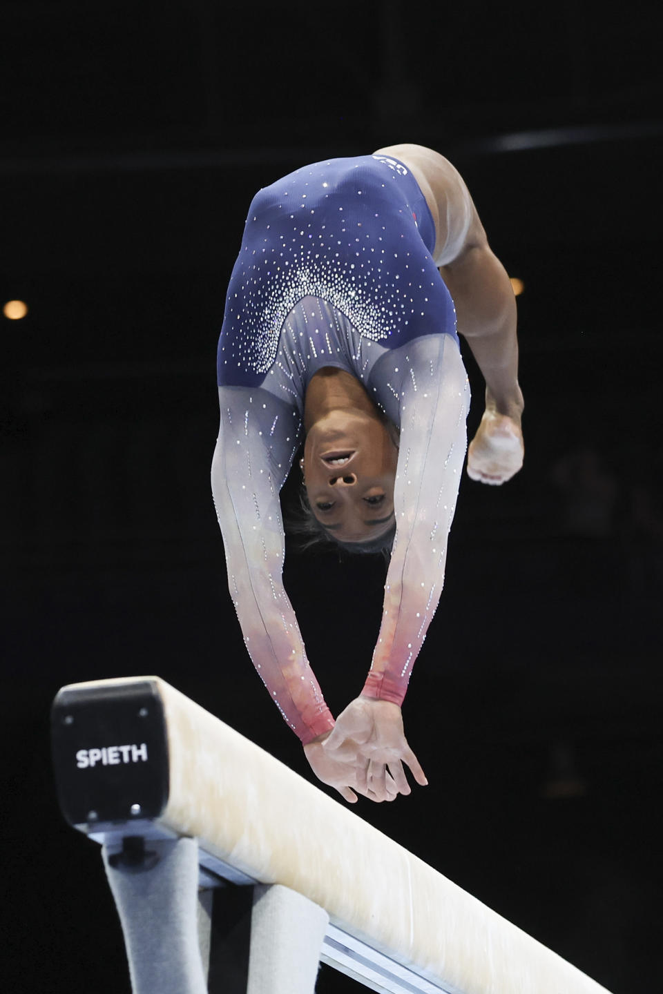 United States' Simone Biles competes on the beam during the women's team final at the Artistic Gymnastics World Championships in Antwerp, Belgium, Wednesday, Oct. 4, 2023. (AP Photo/Geert vanden Wijngaert)