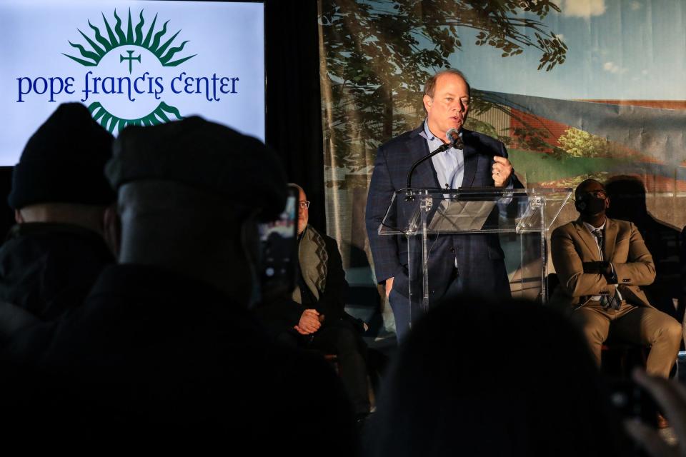 Detroit Mayor Mike Duggan greets the crowd and says today is a great day, during the groundbreaking ceremony for Pope Francis Center’s New Bridge Housing Campus to end chronic homelessness in Detroit on Dec. 3, 2021. The campus has received $30 million to build the development with an extra $6 million from the Julia Burke Foundation for extra construction costs.