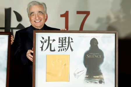 U.S. director Martin Scorsese poses with his handprint during the premiere of "Silence", in Taipei, Taiwan January 19, 2017. REUTERS/Tyrone Siu