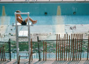 <p>Boy at abandoned diving area, Red Hook Pool, Brooklyn. (Photograph by Paul Hosefros/NYC Parks Photo Archive/Caters News) </p>