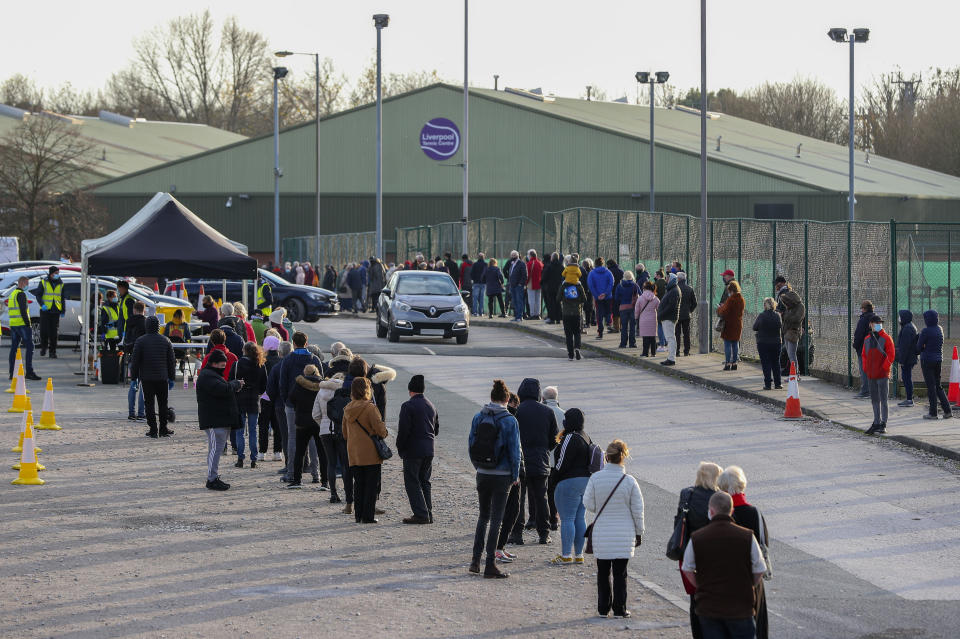 NUMBERPLATES PIXELATED BY PA PICTURE DESK People queue at a Coronavirus testing centre at the Liverpool Tennis Centre in Wavertree, part of the mass Covid-19 testing in Liverpool.