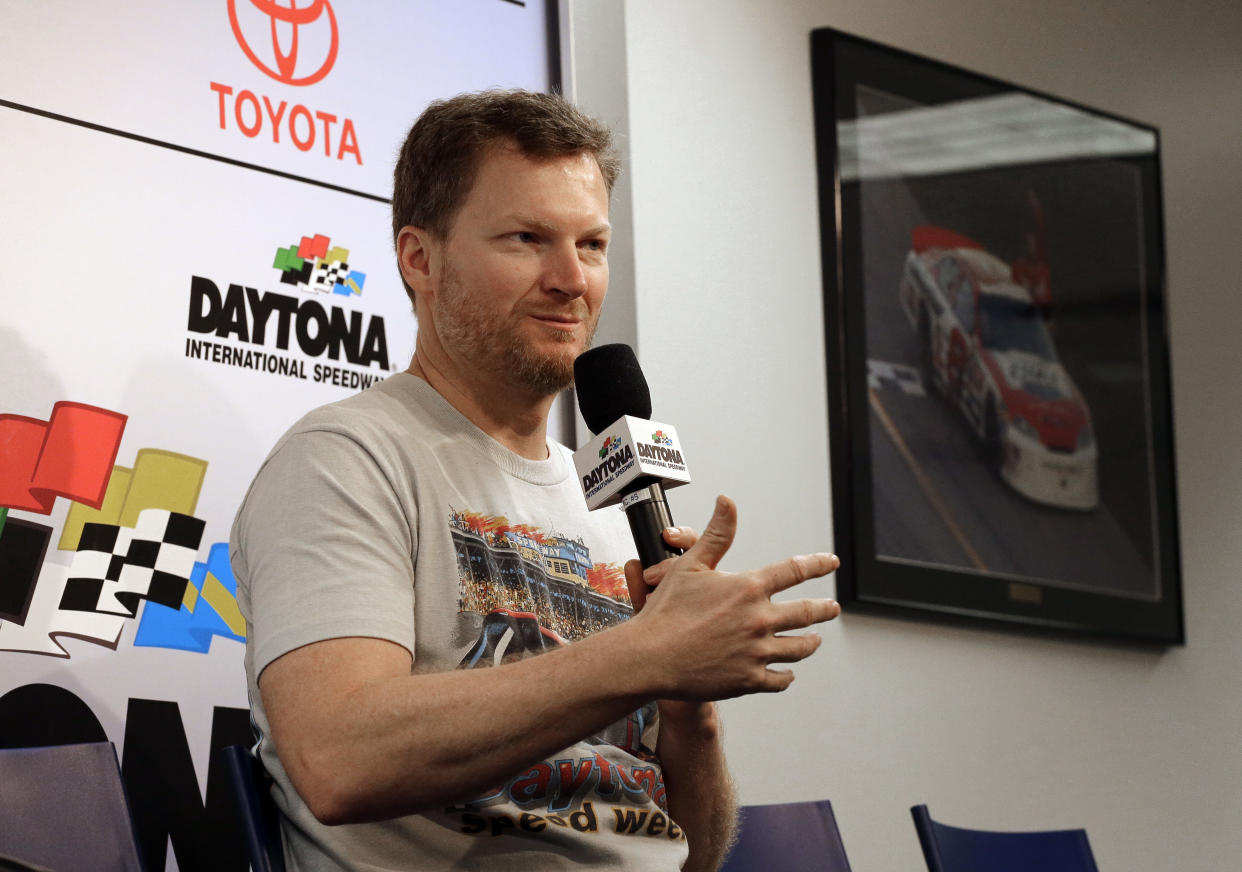 Dale Earnhardt Jr. answers a question from the media during a news conference before the NASCAR Daytona 500 Cup series auto race at Daytona International Speedway in Daytona Beach, Fla., Sunday, Feb. 18, 2018. (AP Photo/Terry Renna)