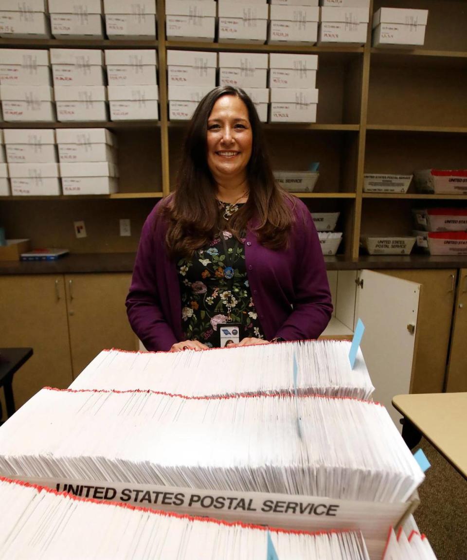 SLO County Clerk-Recorder Elaina Cano watches over processing of vote-by-mail ballots on Nov. 9, 2022.