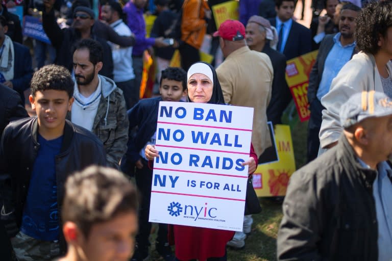 Participants at the #NoMuslimBanEver rally and march in Washington, DC, on October 18, 2017