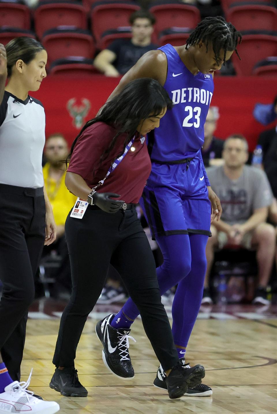 Pistons guard Jaden Ivy is helped off the court after he was injured during the Summer League game on Saturday, July 9, 2022, in Las Vegas.