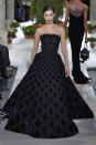<p>Gigi’s younger sister Bella Hadid also proved a talking point at the Oscar de la Renta show courtesy of a showstopping cold-shoulder gown.<em> [Photo: Getty]</em> </p>