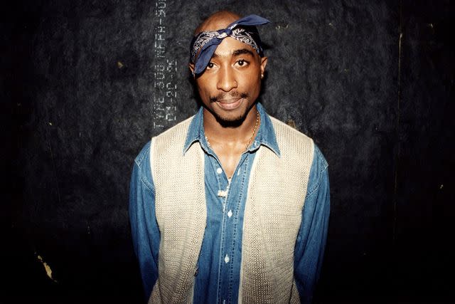 <p>Raymond Boyd/Getty</p> Tupac Shakur poses for photos backstage after his performance at the Regal Theater in Chicago, Illinois in March 1994