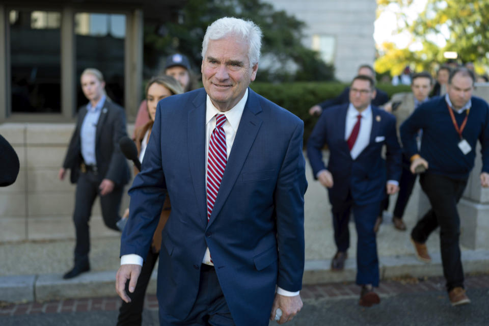 House Majority Whip Rep. Tom Emmer, R-Minn., followed by reporters, leaves the Republican caucus meeting at the Capitol in Washington, Tuesday, Oct. 24, 2023, after withdrawing as Republican nominee for House speaker, becoming the third candidate to fall short. (AP Photo/Jose Luis Magana)