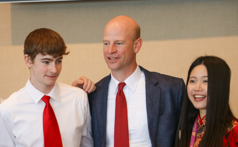 Dan Stein (center), chairman of the Sarah D. Lande US-China Friendship Education Fund, with a Muscatine High student (left) and Heidi Kuo, Chinese teacher at the high school.