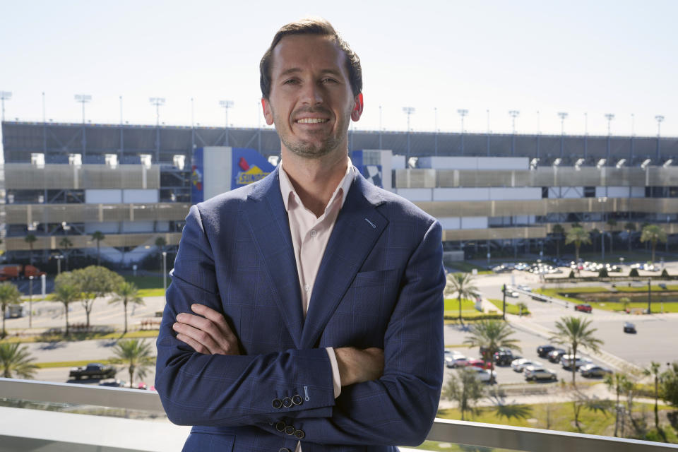 Ben Kennedy, NASCAR Senior Vice President of Racing Development and Strategy for NASCAR at his offices overlooking Daytona International Speedway, Friday, Jan. 27, 2023, in Daytona Beach, Fla. (AP Photo/John Raoux)