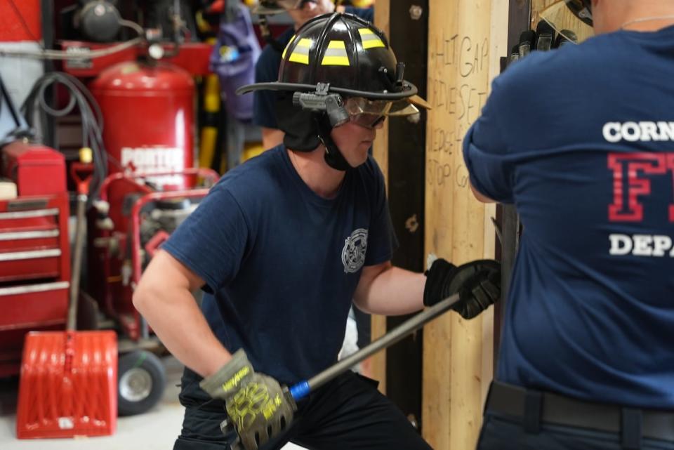 Baranov takes part in a training exercise on forced entry.