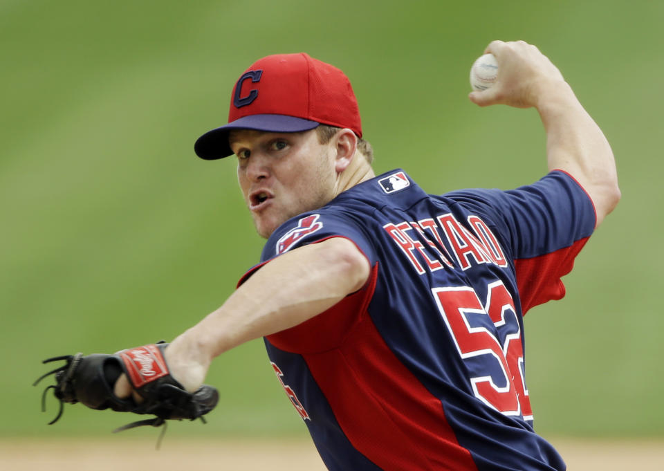 FILE - In this March 27, 2013, file photo, Cleveland Indians relief pitcher Vinnie Pestano throws against the Chicago White Sox in the sixth inning of a spring training baseball game in Glendale, Ariz. San Diego's Andrew Cashner won and Cleveland's Pestano lost as pitchers split decisions Saturday in baseball's first salary arbitration cases in two years.(AP Photo/Mark Duncan, File)