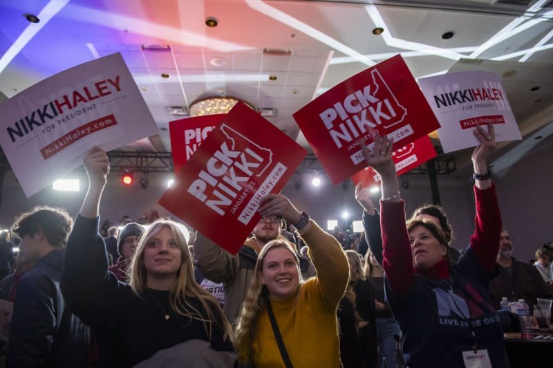 Supporters of former South Carolina Gov. Nikki Haley dance and cheer as they wait for her to take the stage at her election night party in Concord, N.H., on Tuesday. Photo by Amanda Sabga/UPI