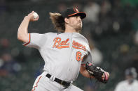 Baltimore Orioles starting pitcher Dean Kremer throws against the Seattle Mariners during the first inning of a baseball game, Monday, May 3, 2021, in Seattle. (AP Photo/Ted S. Warren)