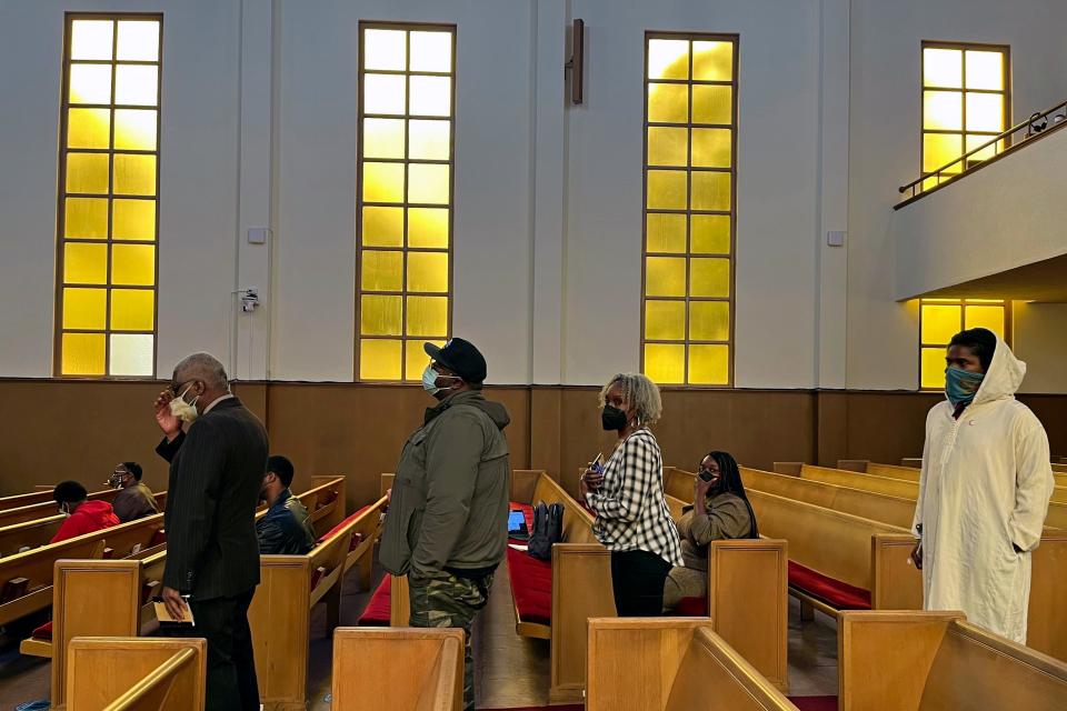 People line up to speak during a California reparations task force meeting at Third Baptist Church in San Francisco, Wednesday, April 13, 2022.