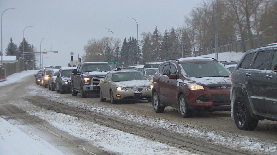 The City of Calgary says crews are clearing and salting the roads to prevent the formation of ice under the sleet-like snowfall.