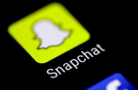 FILE PHOTO: The Snapchat messaging application is seen on a phone screen August 3, 2017.   REUTERS/Thomas White/File Photo