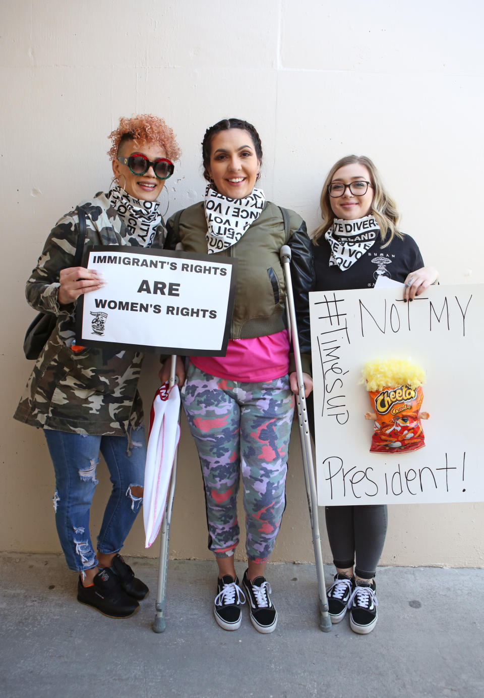 <p>From left: Jasmine Mejia, Jessica Walter, and Samantha Leslie came together from Las Vegas. “We’ve got to come together; it doesn’t matter if you’re injured,” says Walter, who has a dislocated knee. Leslie says, “I’m here to support all women, to support Planned Parenthood, and the fact that we’ve come so far and are now at a stalemate.” (Photo: Ronda Churchill for Yahoo Lifestyle) </p>