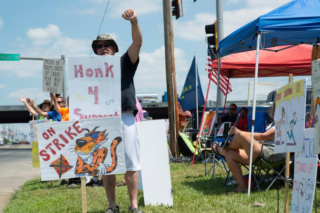 Ron Sadler, a 32-year employee at Frito-Lay’s facility in Topeka, Kansas, joins a union strike. (AP)