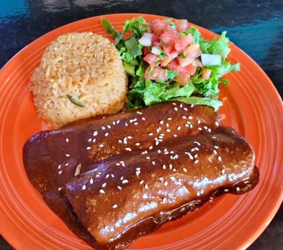 Chicken enmoladas (enchiladas in mole) at Enchiladas Ole. Handout photo