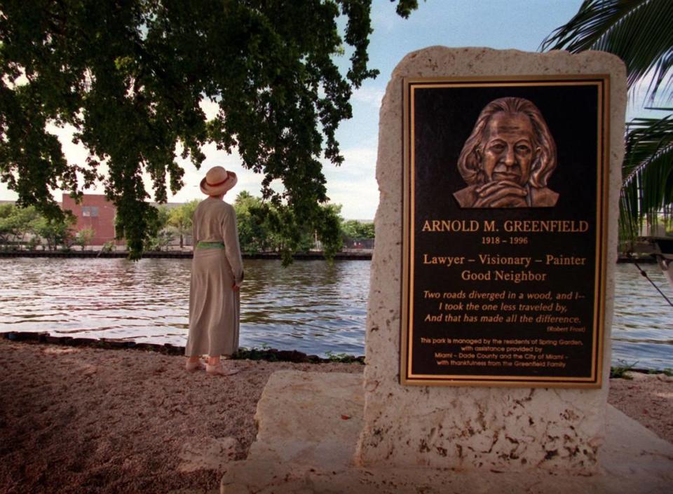 In this file photo from Sept. 18, 1999, Ruth Greenfield looks over the Miami River in the Spring Gardens park, that was dedicated to her husband, Arnold M. Greenfield.