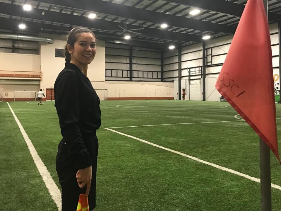 Shukwia Tajik is a provincial referee for Saskatchewan Soccer who lives and works in Saskatoon.  (Theresa Kliem/CBC - image credit)