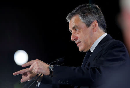 Francois Fillon, former French Prime Minister, member of the Republicans political party and 2017 French presidential election candidate of the French centre-right, attends a political rally in Marseille, France, April 11, 2017. REUTERS/Jean-Paul Pelissier