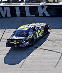 Denny Hamlin ended up in the fence after Clint Bowyer's retaliation in Saturday's Nationwide race