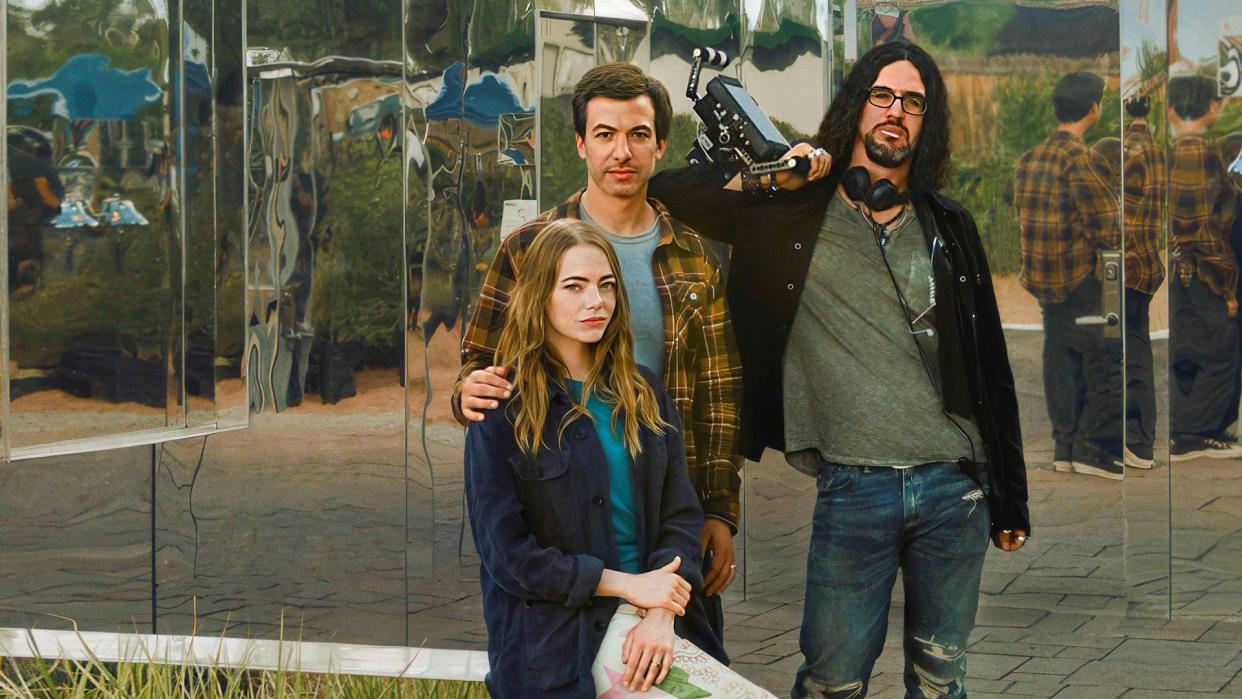  Emma Stone, Nathan Fielder and Benny Safdie posing in front of a mirrored surface in The Curse, one of the best Paramount Plus shows. 
