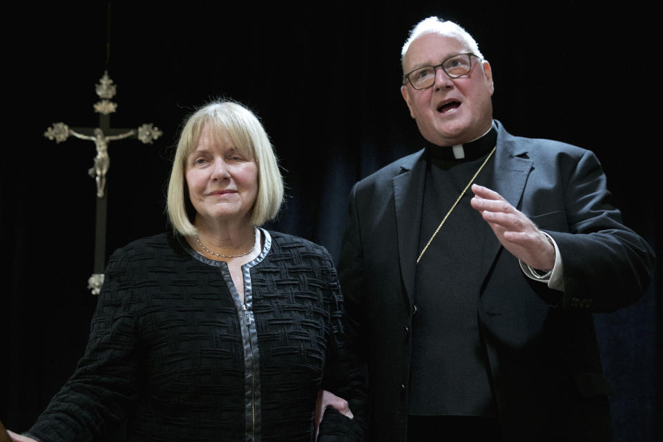 Cardinal Timothy Dolan addresses a news conference at the offices of the New York Archdiocese, in New York, Thursday, Sept. 20, 2018. The Roman Catholic Archdiocese of New York said Thursday that it has hired former federal judge Barbara Jones, left, to review its procedures and protocols for handling allegations of sexual abuse. (AP Photo/Richard Drew)