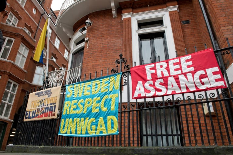 Banners supporting WikiLeaks founder Julian Assange outside the Ecuadoran embassy in London where he has been holed up since 2012