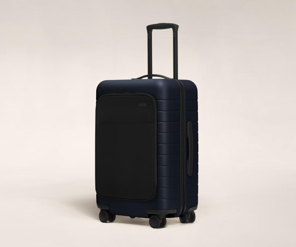 <p><a href="https://go.redirectingat.com?id=74968X1596630&url=https%3A%2F%2Fwww.awaytravel.com%2Fsuitcases%2Fbigger-carry-on-pocket%3Fcolor%3Dnavy_nylon_pocket&sref=https%3A%2F%2F" rel="nofollow noopener" target="_blank" data-ylk="slk:Shop Now;elm:context_link;itc:0;sec:content-canvas" class="link ">Shop Now</a></p><p>The Bigger Carry-On with Pocket</p><p>awaytravel.com</p><p>$345.00</p><span class="copyright">Away</span>