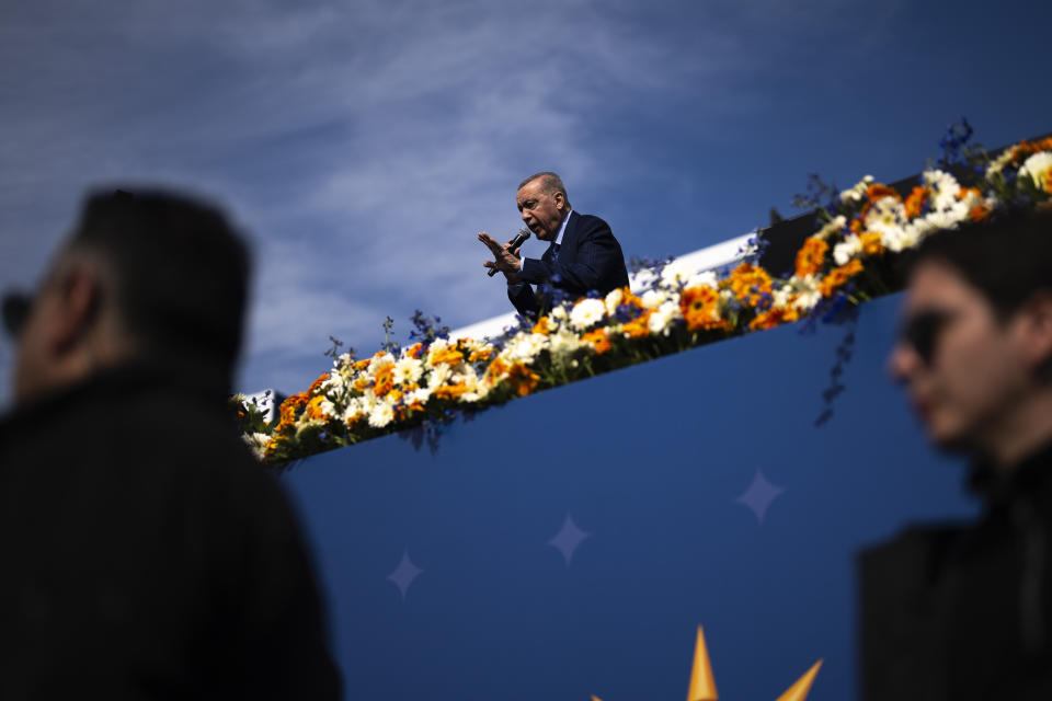 Turkish President and leader of the Justice and Development Party, or AKP, Recep Tayyip Erdogan, gives a speech during a campaign rally ahead of nationwide municipality elections, in Istanbul, Turkey, Sunday, March 24, 2024. With local elections across Turkey days away, legal experts are coaching thousands of volunteer election monitors on the rules they'll need to watch for fraud and ensure a fair vote. (AP Photo/Francisco Seco)