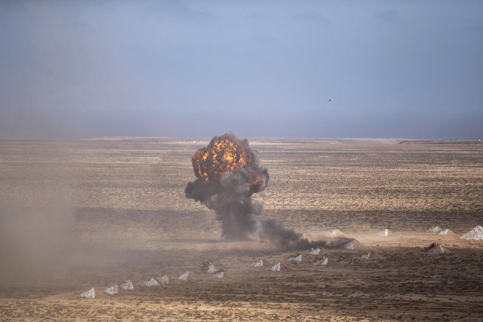 A target is hit with artillery fire as U.S and Morocco military forces take part in the African Lion military exercise, in Tantan, south of Agadir, Morocco, Friday, June 18, 2021. The U.S.-led African Lion war games, which lasted nearly two weeks, stretched across Morocco, a key U.S, ally, with smaller exercises held in Tunisia and in Senegal, whose troops ultimately moved to Morocco. (AP Photo/Mosa'ab Elshamy)