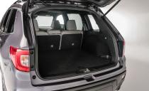 <p>The Passport holds nearly as much stuff as does its bigger brother, giving up only six cubic feet of cargo room to the Pilot behind its second-row seats and six cubes behind its first-row seats.</p>