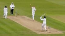 England's Stuart Broad takes the wicket of Sri Lanka's Dinesh Chandimal Action Images via Reuters / Jason Cairnduff