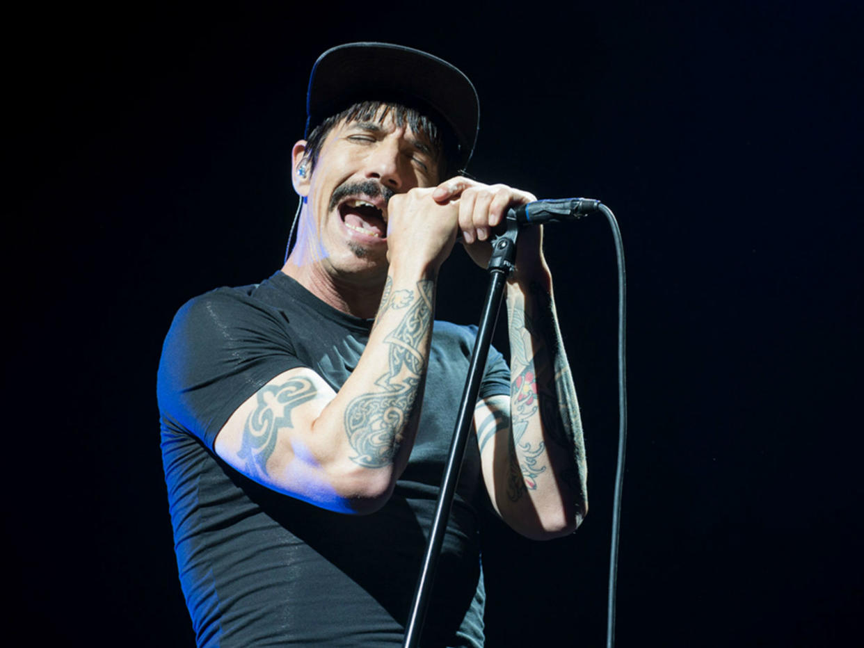 Red Hot Chili Peppers' Anthony Kiedis performing on stage at the O2 in London: Neil Lupin/neillupin.com