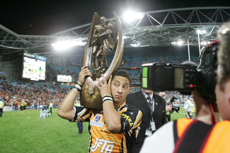 Benji Marshall (pictured) with the trophy after the NRL Grand Final.