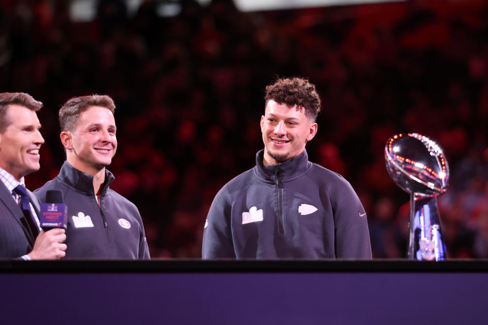 LAS VEGAS, NV - FEBRUARY 05: San Francisco 49ers quarterback Brock Purdy (13) and Kansas City Chiefs quarterback Patrick Mahomes (15) meet on stage during the Super Bowl LVIII Opening Night presented by Gatorade featuring the AFC Champions Kansas City Chiefs and the NFC Champions San Francisco 49ers on Monday, Feb. 5, 2024, at Allegiant Stadium in Las Vegas, Nevada. (Photo by Marc Sanchez/Icon Sportswire via Getty Images)