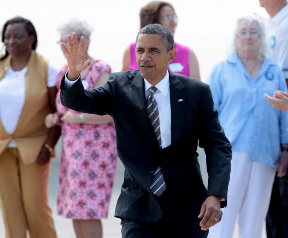 President Barack Obama arrives at the Eastern Iowa Airport in Cedar Rapids, Iowa, Tuesday July 10, 2012. (AP Photo/Conrad Schmidt)