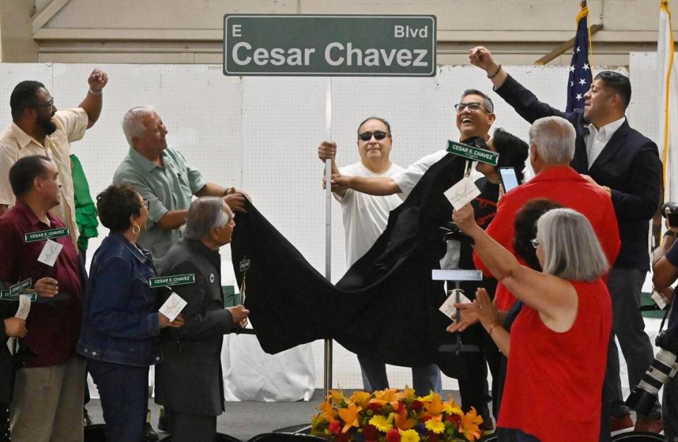 A symbolic street sign honoring Cesar E. Chavez Boulevard is unveiled during the street renaming celebration at the Fresno Fairgrounds Saturday, June 10, 2023 in Fresno.