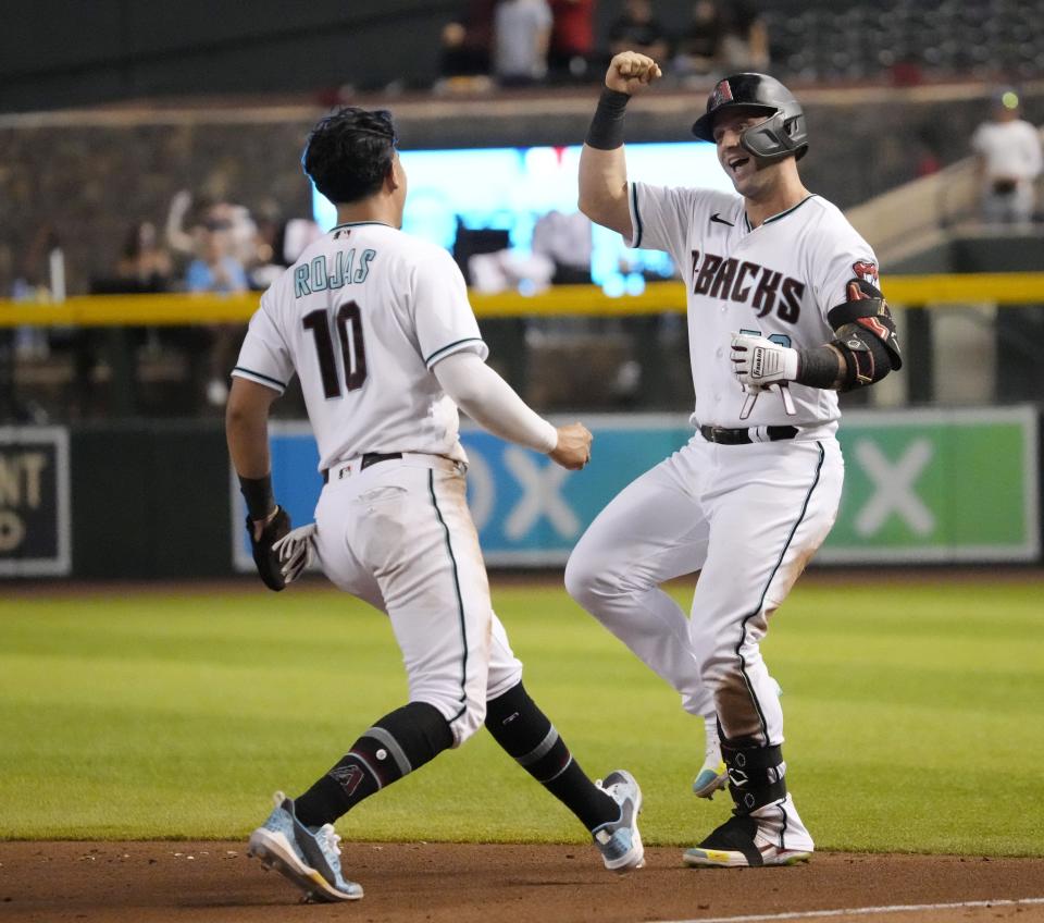 Jun 28, 2022; Phoenix, Ariz., U.S.;  Arizona Diamondbacks' Arizona Diamondbacks' Christian Walker (53) and Josh Rojas (10) celebrate after beating the San Diego Padres 7-6 on a fielder's choice in the ninth inning at Chase Field. Mandatory Credit: Michael Chow-Arizona Republic