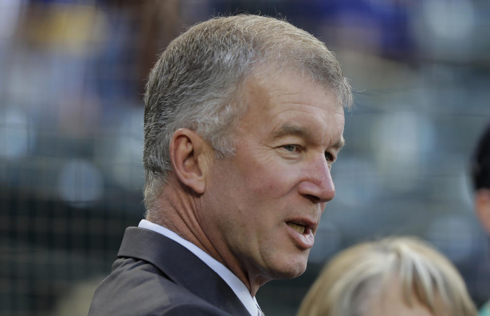 FILE - In this Aug. 3, 2018, file photo, then-Seattle Mariners president Kevin Mather stands on the field before the team's baseball game against the Toronto Blue Jays in Seattle. Mather apologized late Sunday night, Feb. 21, 2021, for comments made during a recent online event where he expressed opinions about organizational strategy, personnel moves and club finances. Mather’s comments came in a speech to the Bellevue, Wash., Breakfast Rotary Club on Feb. 5 and were posted online over the weekend. (AP Photo/Ted S. Warren, File)