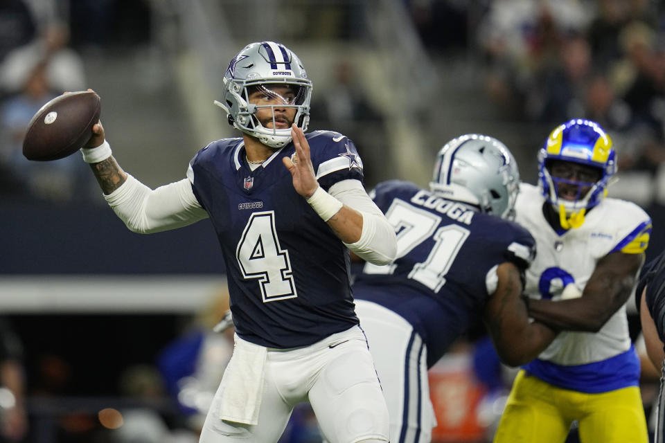 Dallas Cowboys quarterback Dak Prescott (4) throws a pass during the first half of an NFL football game against the Los Angeles Rams Sunday, Oct. 29, 2023, in Arlington, Texas. (AP Photo/Julio Cortez)