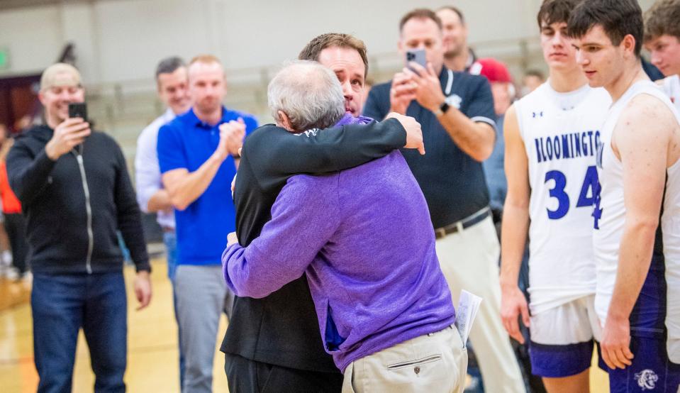 South Head Coach JR Holmes gets a hig hug from his son Jon Holmes after the Terre Haute North versus Bloomington South boys basketball game at Bloomington High School South on Friday, Dec. 15, 2023.