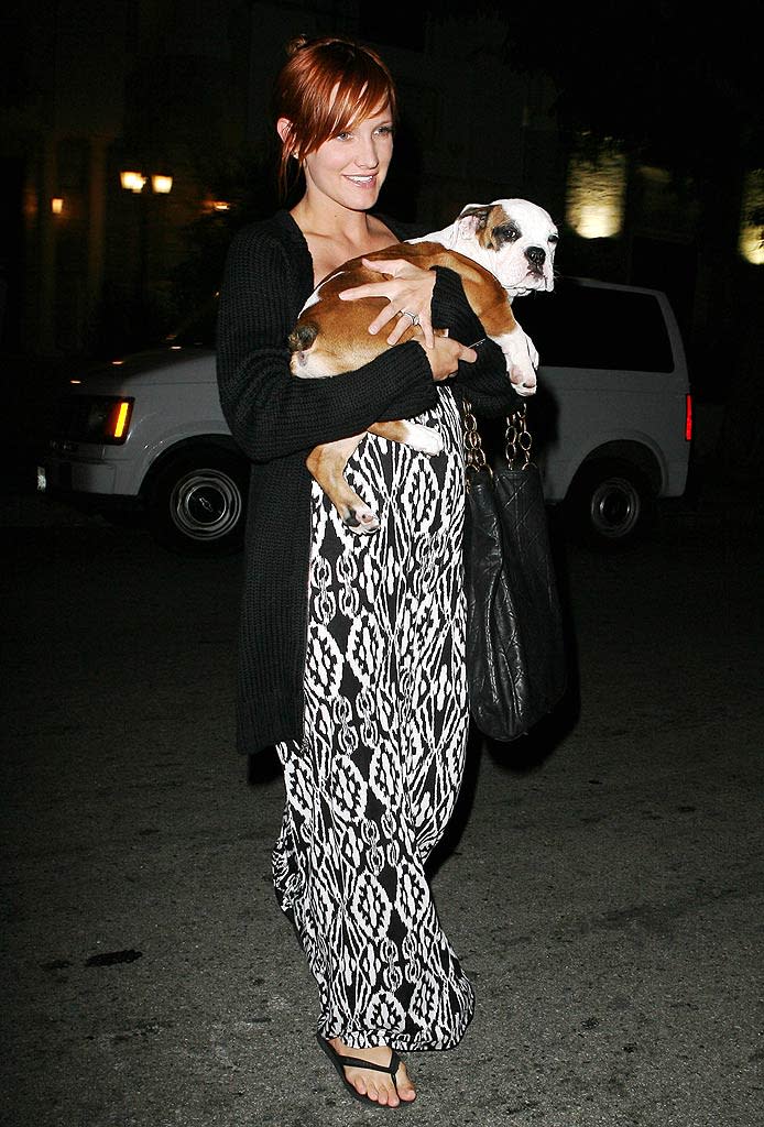 Simpson Ashlee Holding Dog