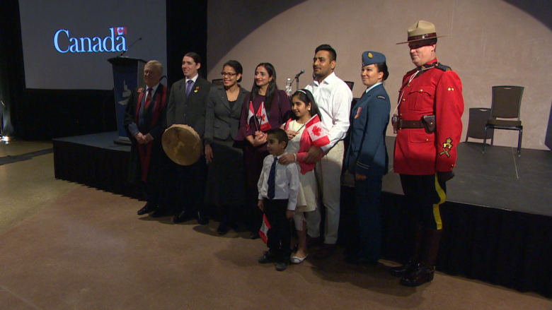 'The country opens up its heart': 48 new Canadians celebrate citizenship at human rights museum